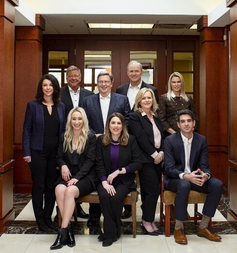Tabor Law Firm's partners and employees posing