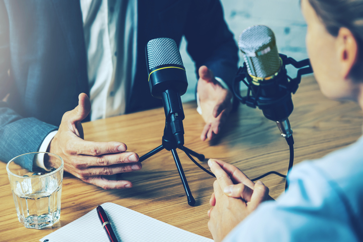 radio interview, podcast recording - business people talking in broadcasting studio radio interview, podcast recording - business people talking in broadcasting studio