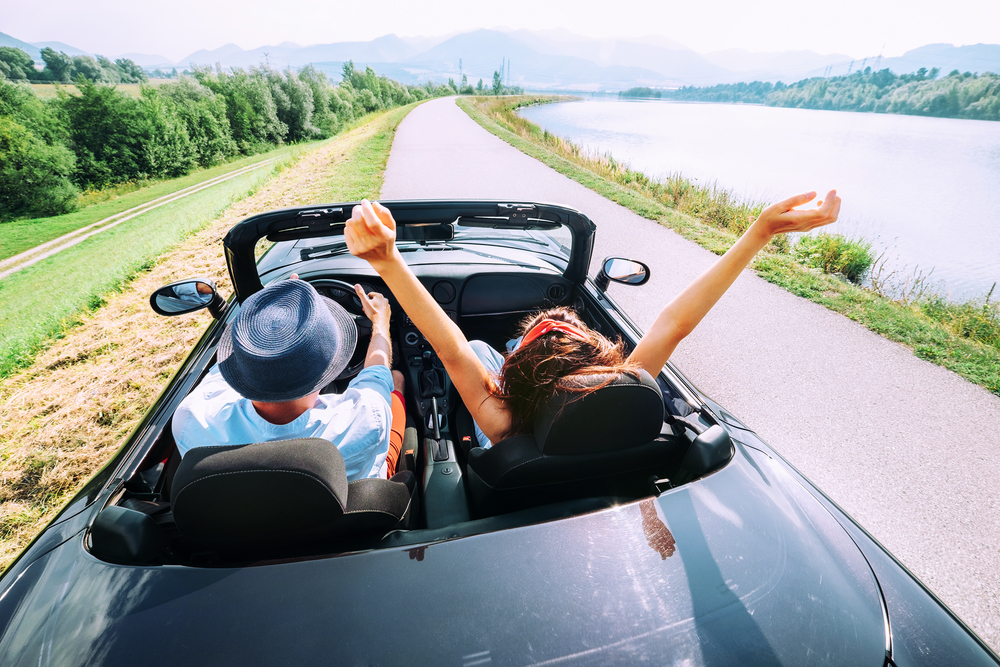 Couple,In,Love,Ride,In,Cabriolet,Car